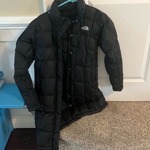 Black north face winter jacket.